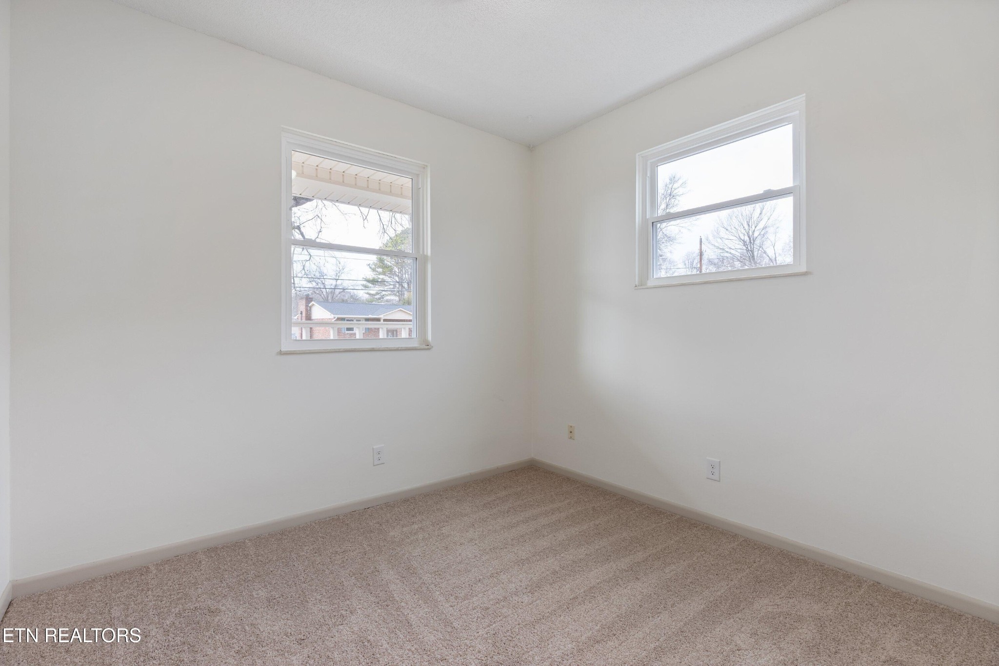 912 Naples Road Knoxville, TN 37923 - Photo 29 of 49 an empty room with a window