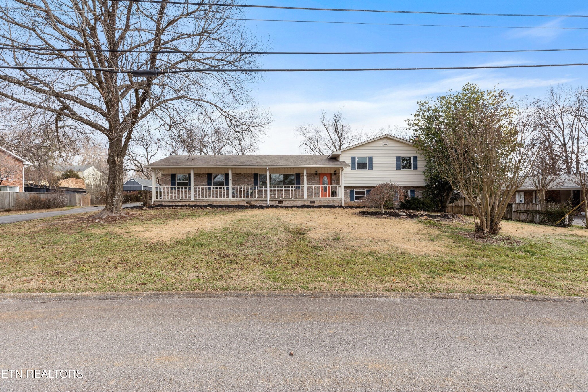 912 Naples Road Knoxville, TN 37923 - Photo 3 of 49 a view of a house with a large tree in front of it