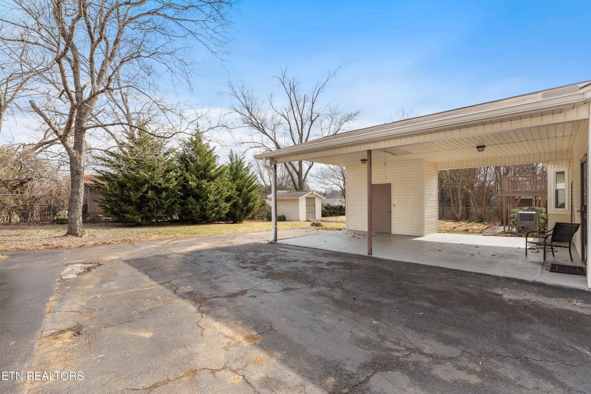 912 Naples Road Knoxville, TN 37923 - Photo 37 of 49 a view of a house with backyard and trees