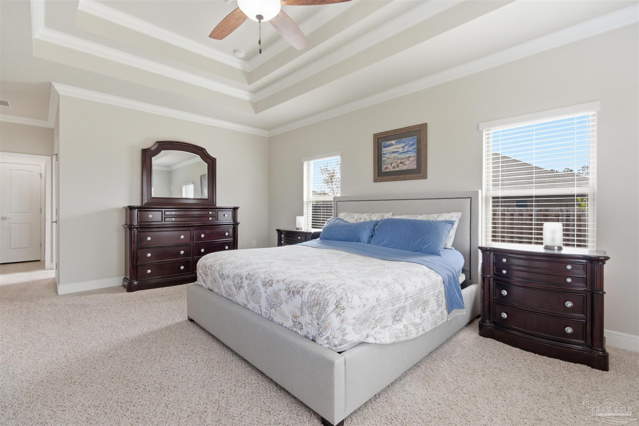 2677 Tulip Hill Road Pace, FL 32571 - Photo 20 of 35 a bedroom with a bed and a dresser