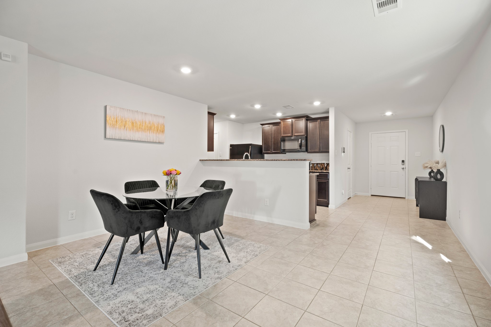 6214 El Topacio Drive Houston, TX 77048 - Photo 13 of 27 a view of a dining room with furniture and wooden floor