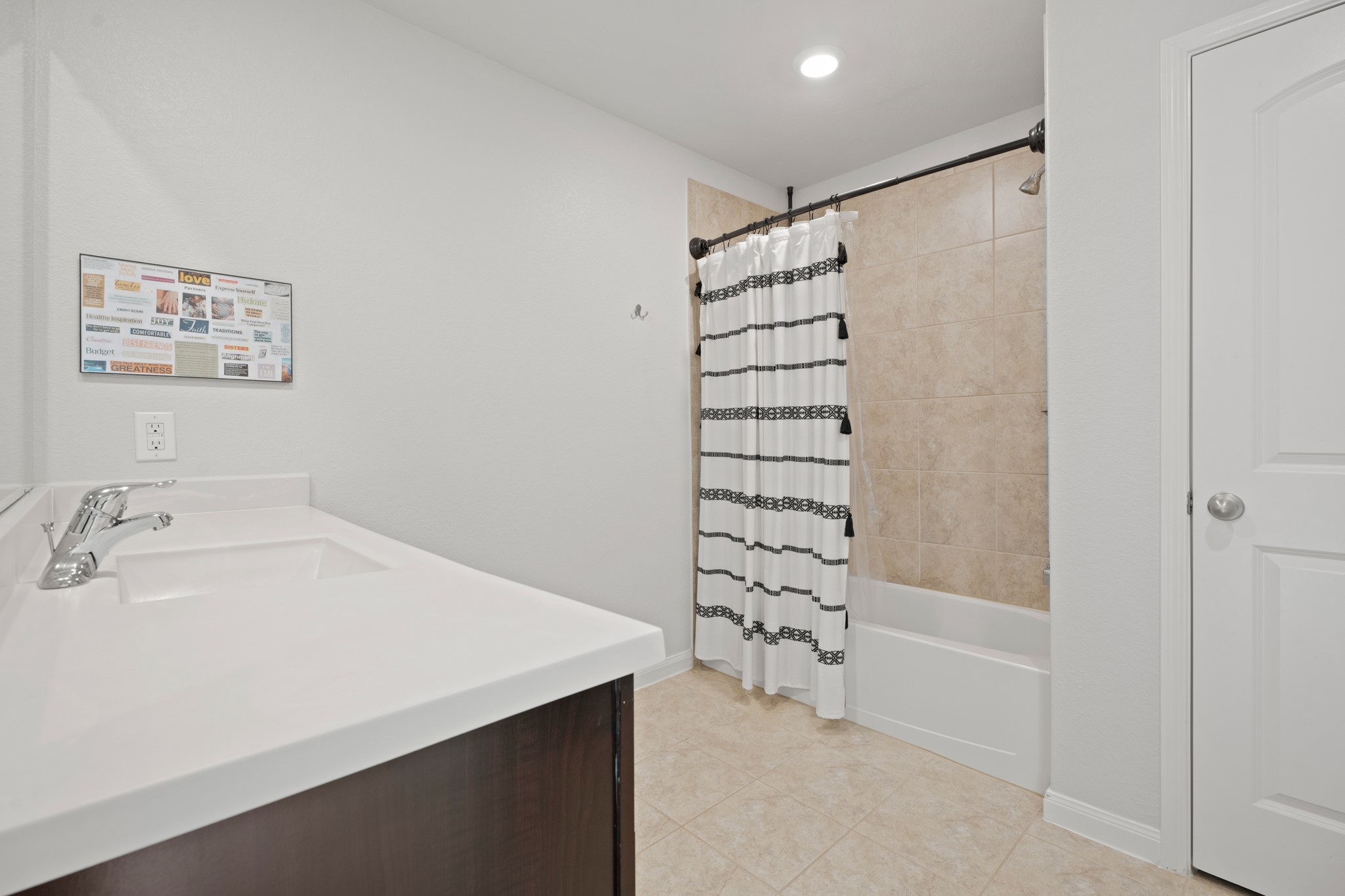 6214 El Topacio Drive Houston, TX 77048 - Photo 19 of 27 a bathroom with a bathtub and a shower