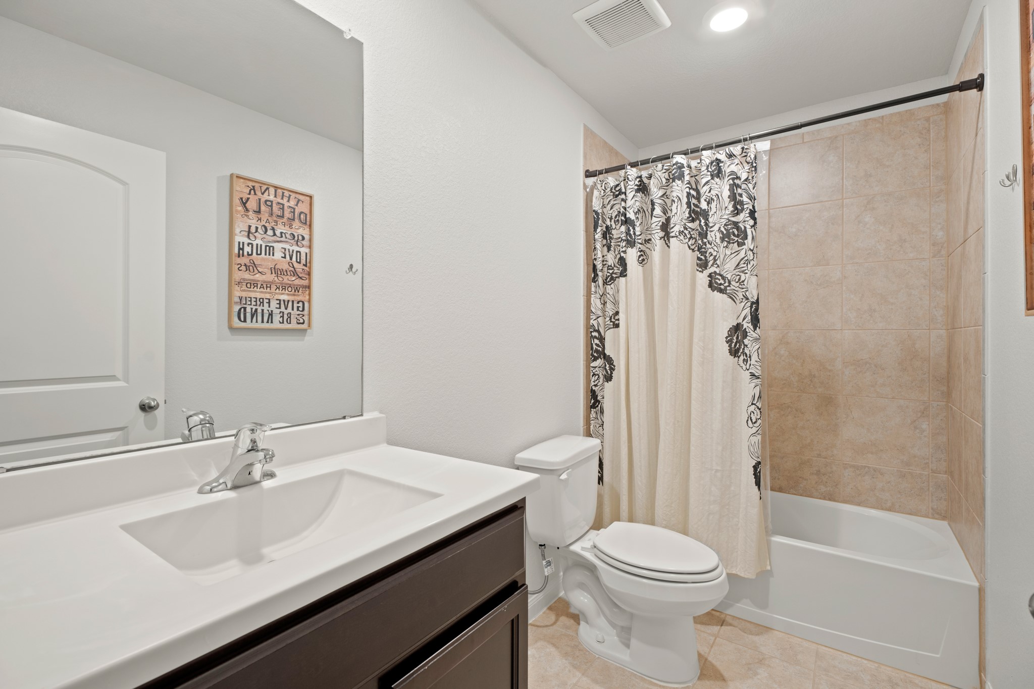 6214 El Topacio Drive Houston, TX 77048 - Photo 22 of 27 a bathroom with a sink and a toilet