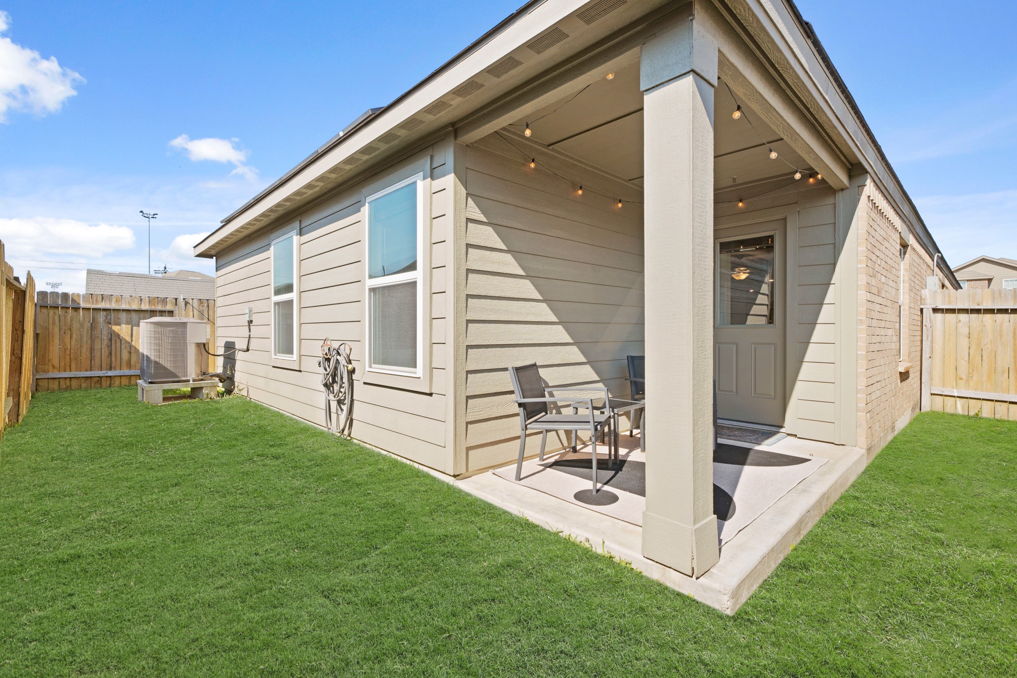6214 El Topacio Drive Houston, TX 77048 - Photo 25 of 27 a view of a backyard with sitting area