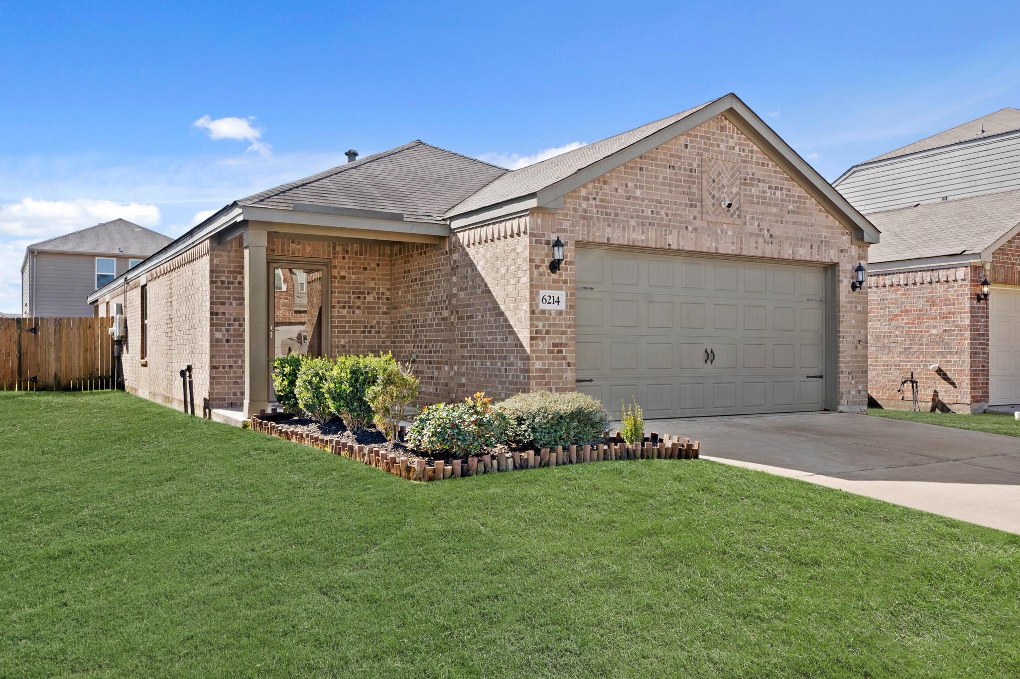 6214 El Topacio Drive Houston, TX 77048 - Photo 3 of 27 a front view of house with garden