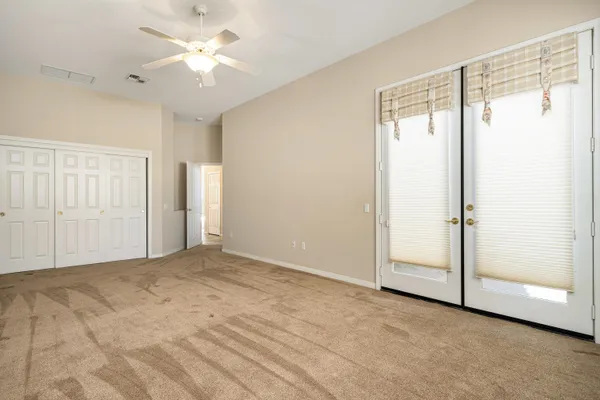 a view of a house with a small yard