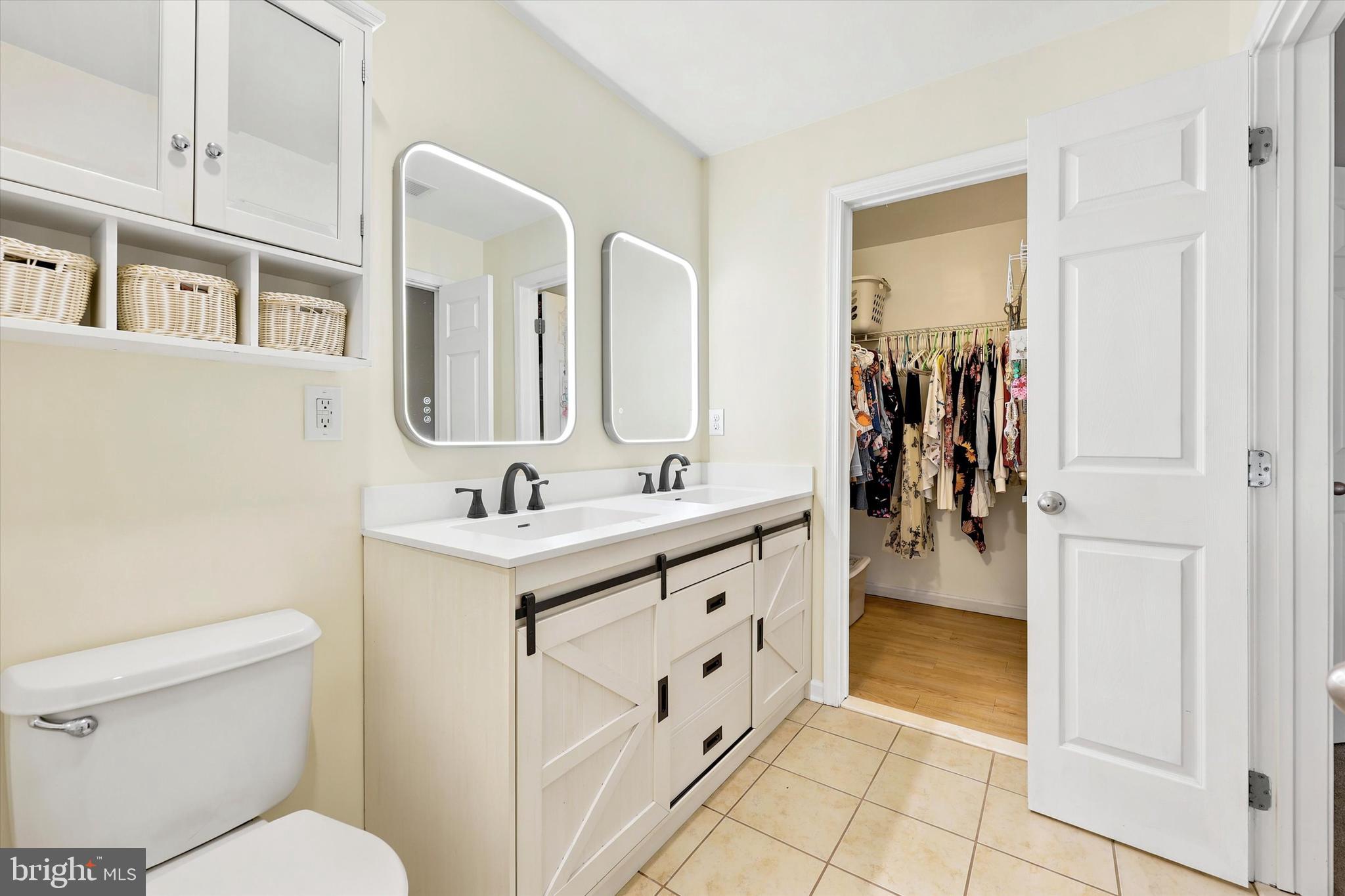 448 Aura Road Glassboro, NJ 08028 - Photo 29 of 33 recently renovated bathroom with double vanity