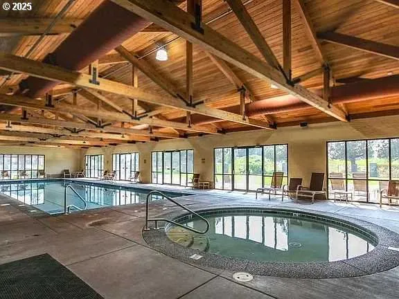 a view of a patio with swimming pool