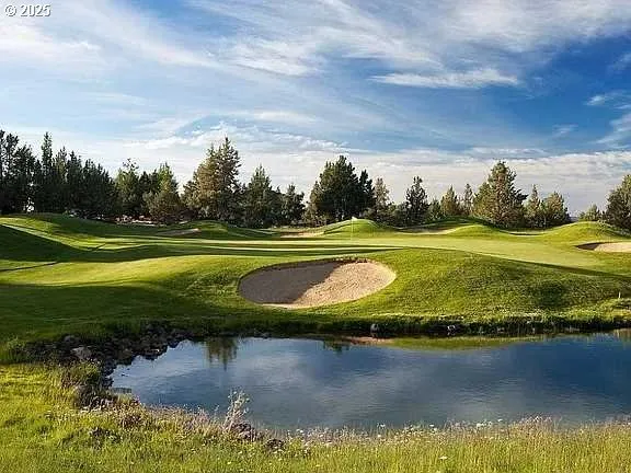 a view of a lake with a big yard