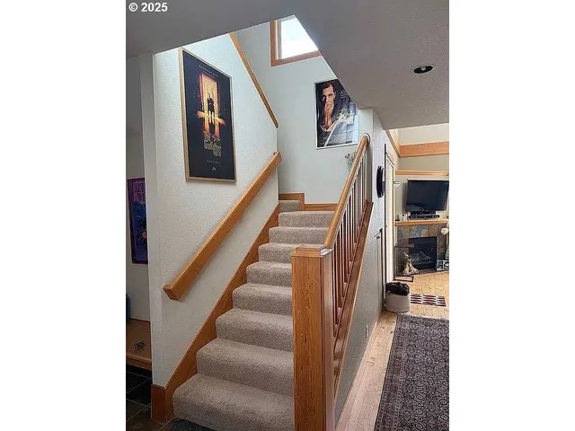 a view of a hallway with staircase