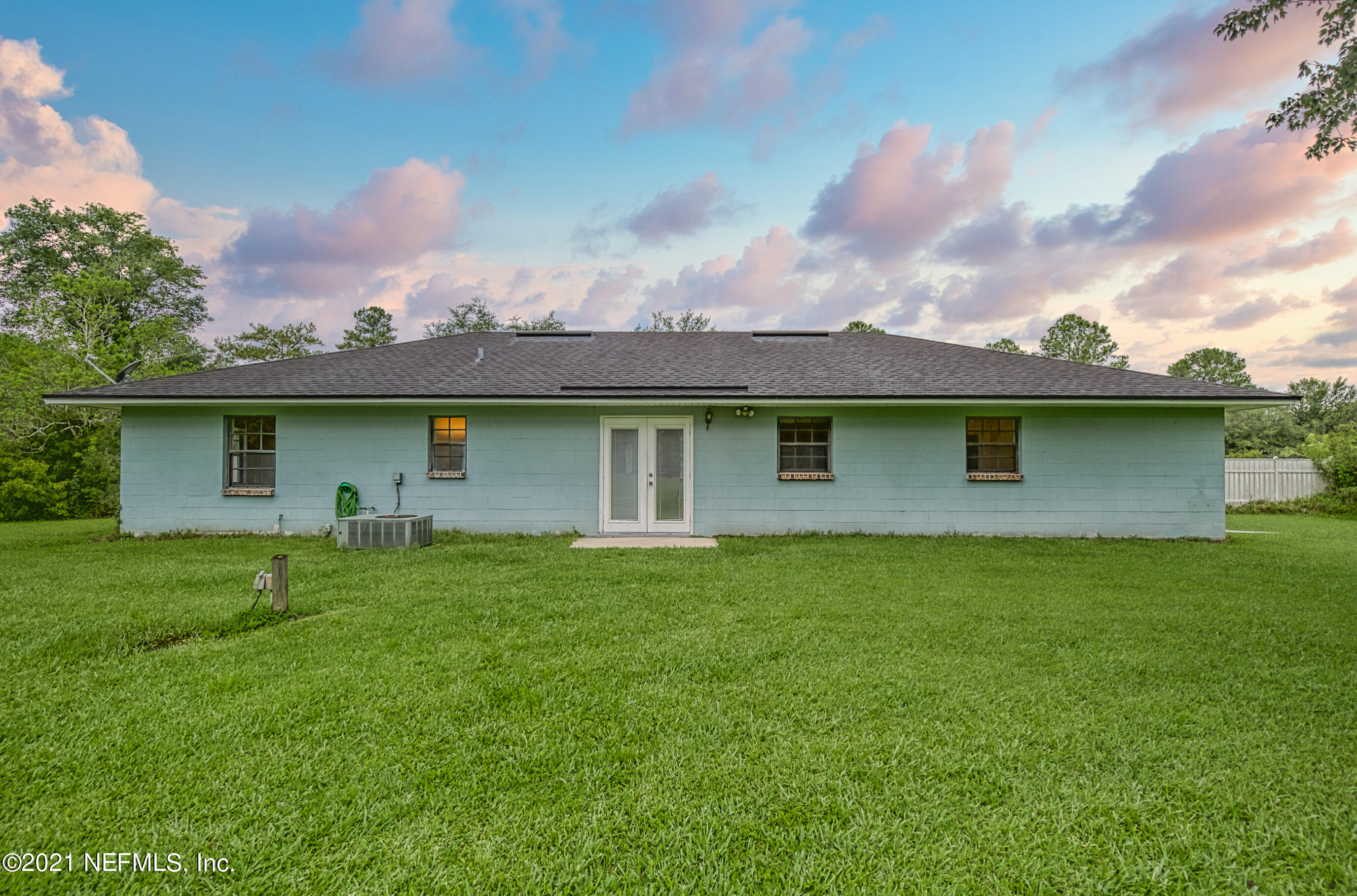 54212 Armstrong Road Callahan, FL 32011 - Photo 44 of 47 a front view of a house with garden