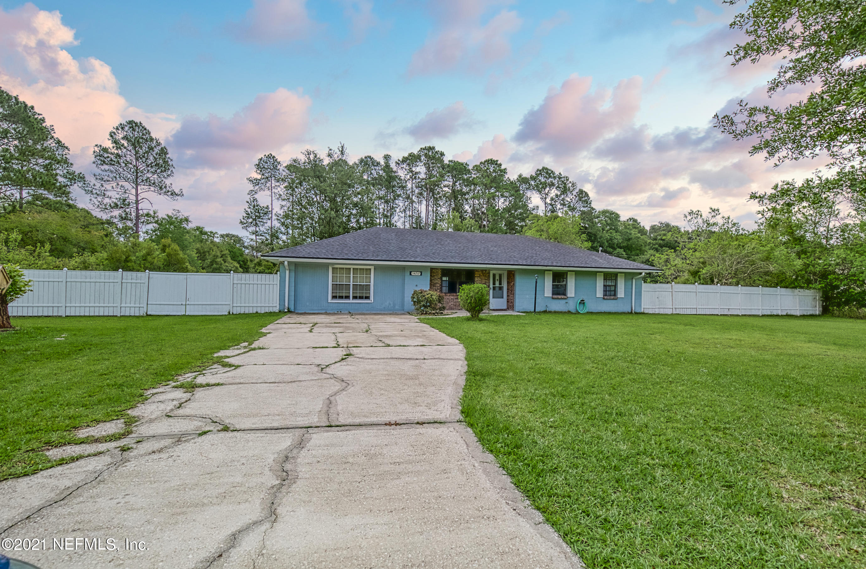 54212 Armstrong Road Callahan, FL 32011 - Photo 47 of 47 a front view of a house with a yard