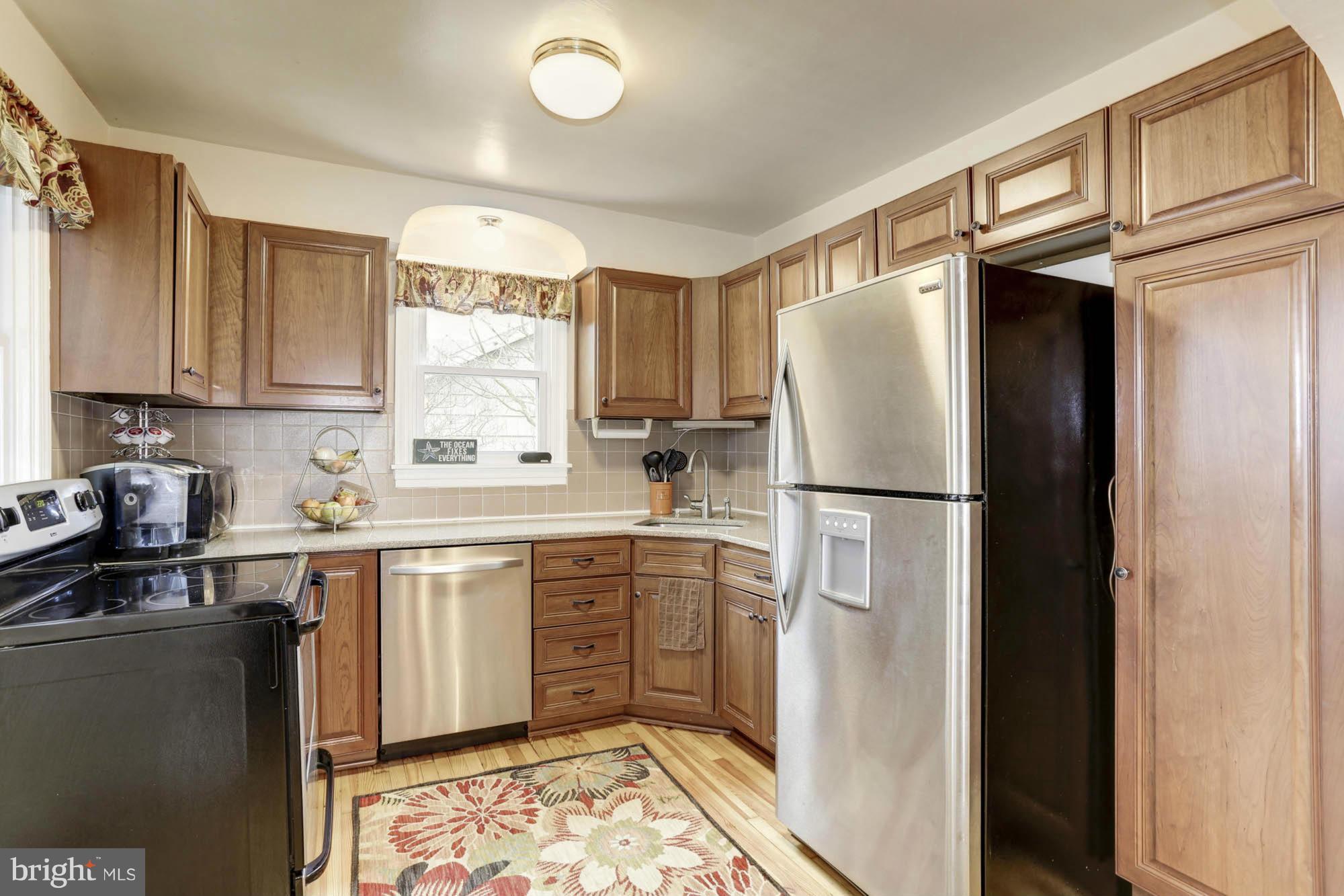 213 Gibson Road Annapolis, MD 21401 - Photo 14 of 30 Remodeled Kitchen Cabinetry / Stainless Appliances