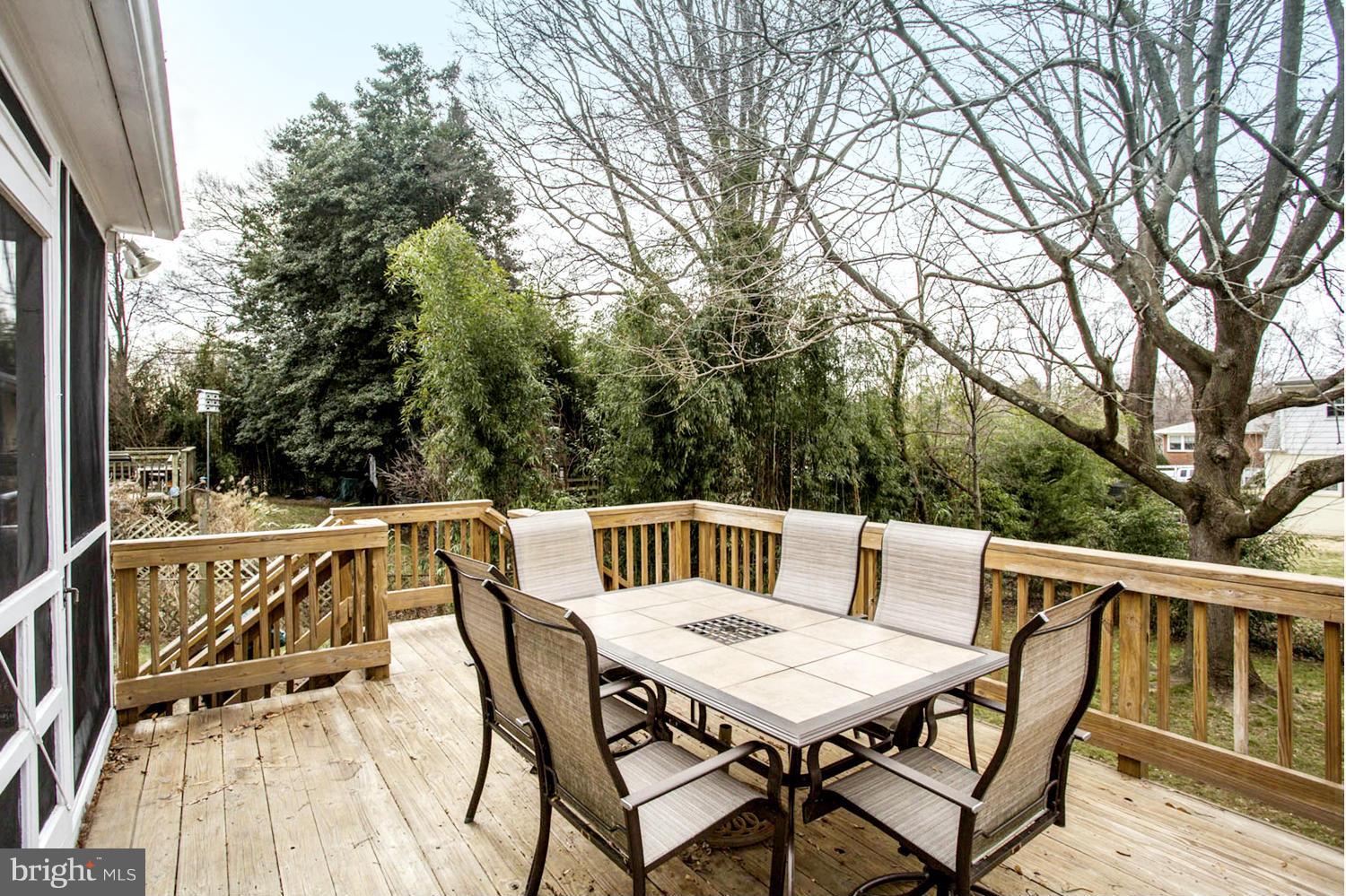 213 Gibson Road Annapolis, MD 21401 - Photo 17 of 30 Open Air Raised Deck with Steps Descending to Yard