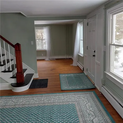 a view of an entryway with a window