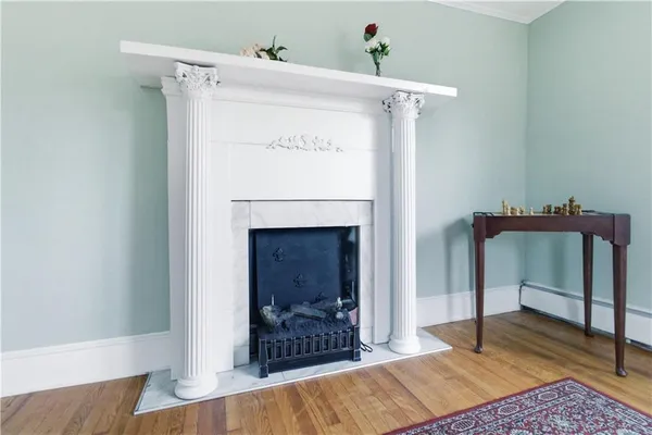 a hallway with a bench in it