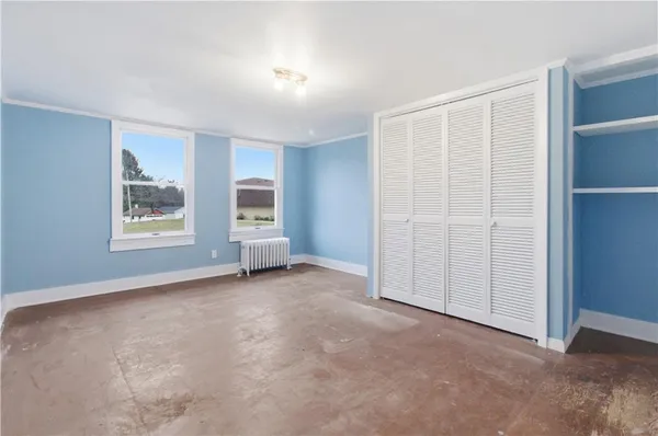 an empty room with windows