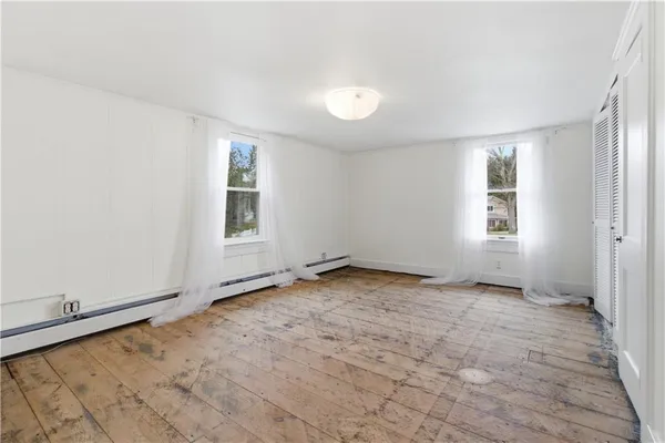 an empty room with windows