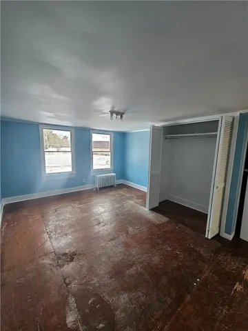 an empty room with windows