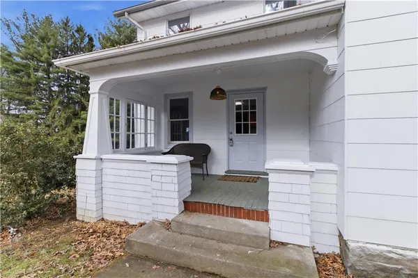 a front view of a house with garage