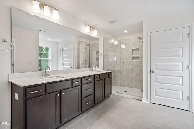 a view of a garden with a swimming pool