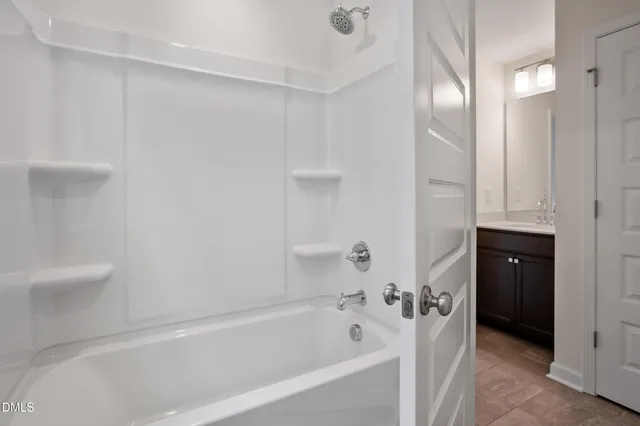 a view of a backyard of the house