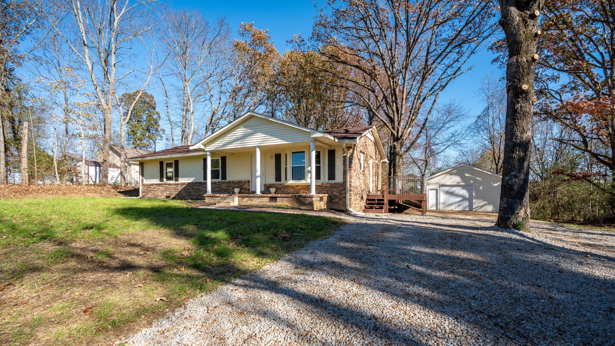 3993 Clanton Road Lawrenceburg, TN 38464 - Photo 1 of 24 a front view of a house with yard and green space