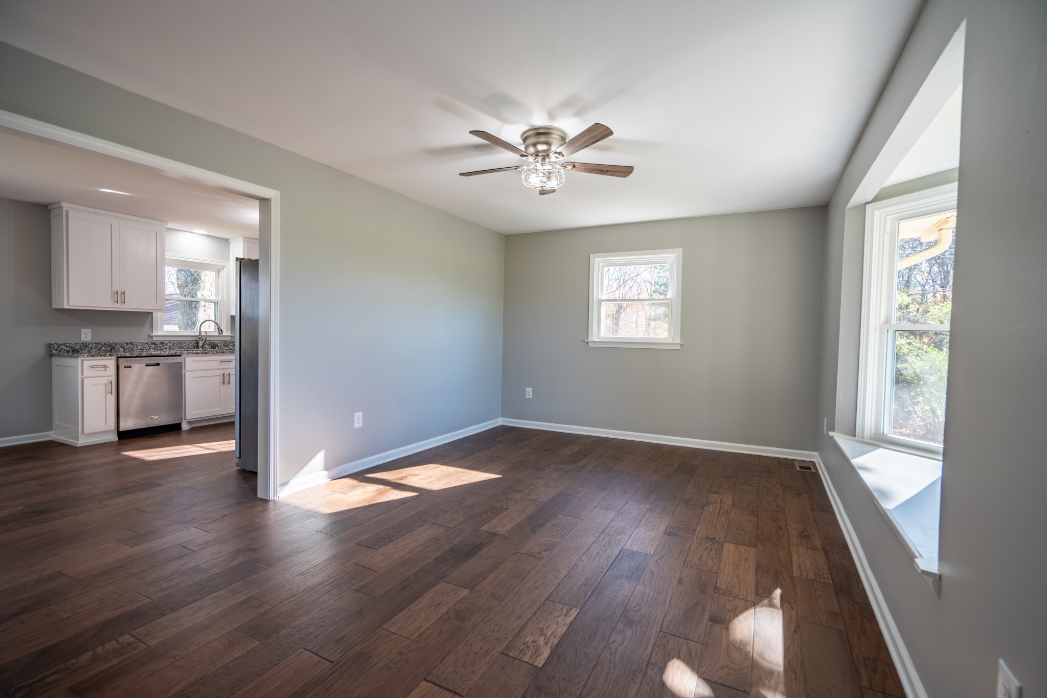 3993 Clanton Road Lawrenceburg, TN 38464 - Photo 10 of 24 a view of an empty room with wooden floor and a window