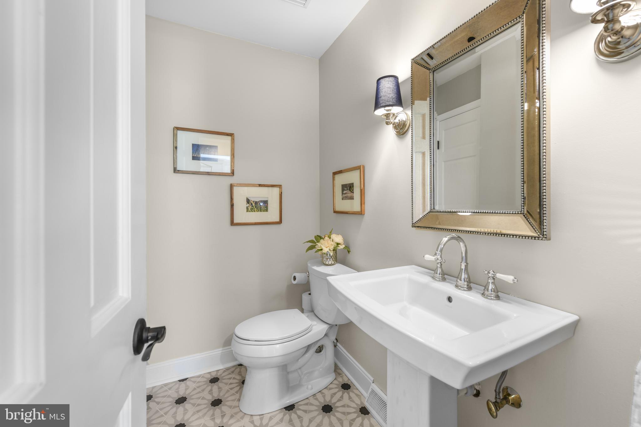 530 Arrowhead Trail Sinking Spring, PA 19608 - Photo 20 of 52 a bathroom with a sink toilet and a mirror