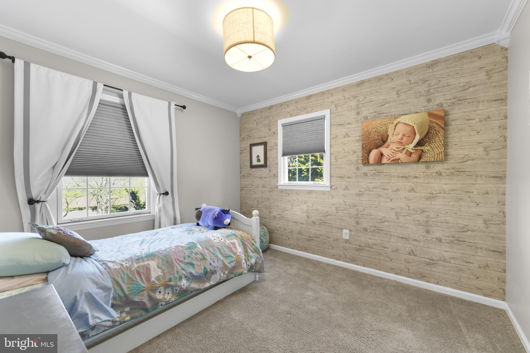 530 Arrowhead Trail Sinking Spring, PA 19608 - Photo 27 of 52 a bedroom with a bed and a window