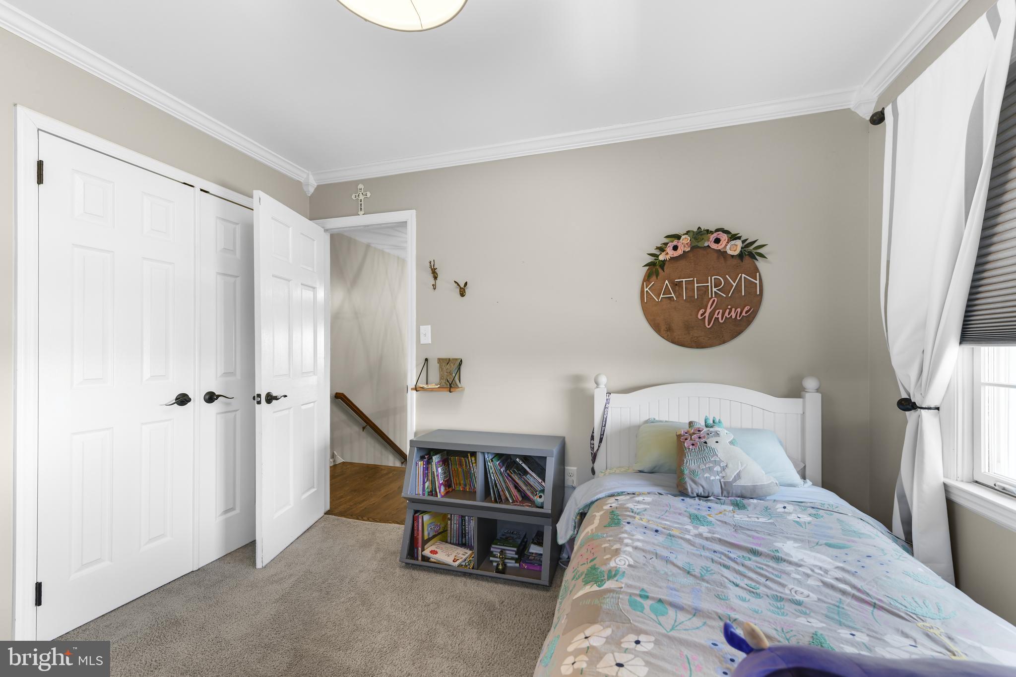 530 Arrowhead Trail Sinking Spring, PA 19608 - Photo 28 of 52 a bedroom with a bed and a chandelier