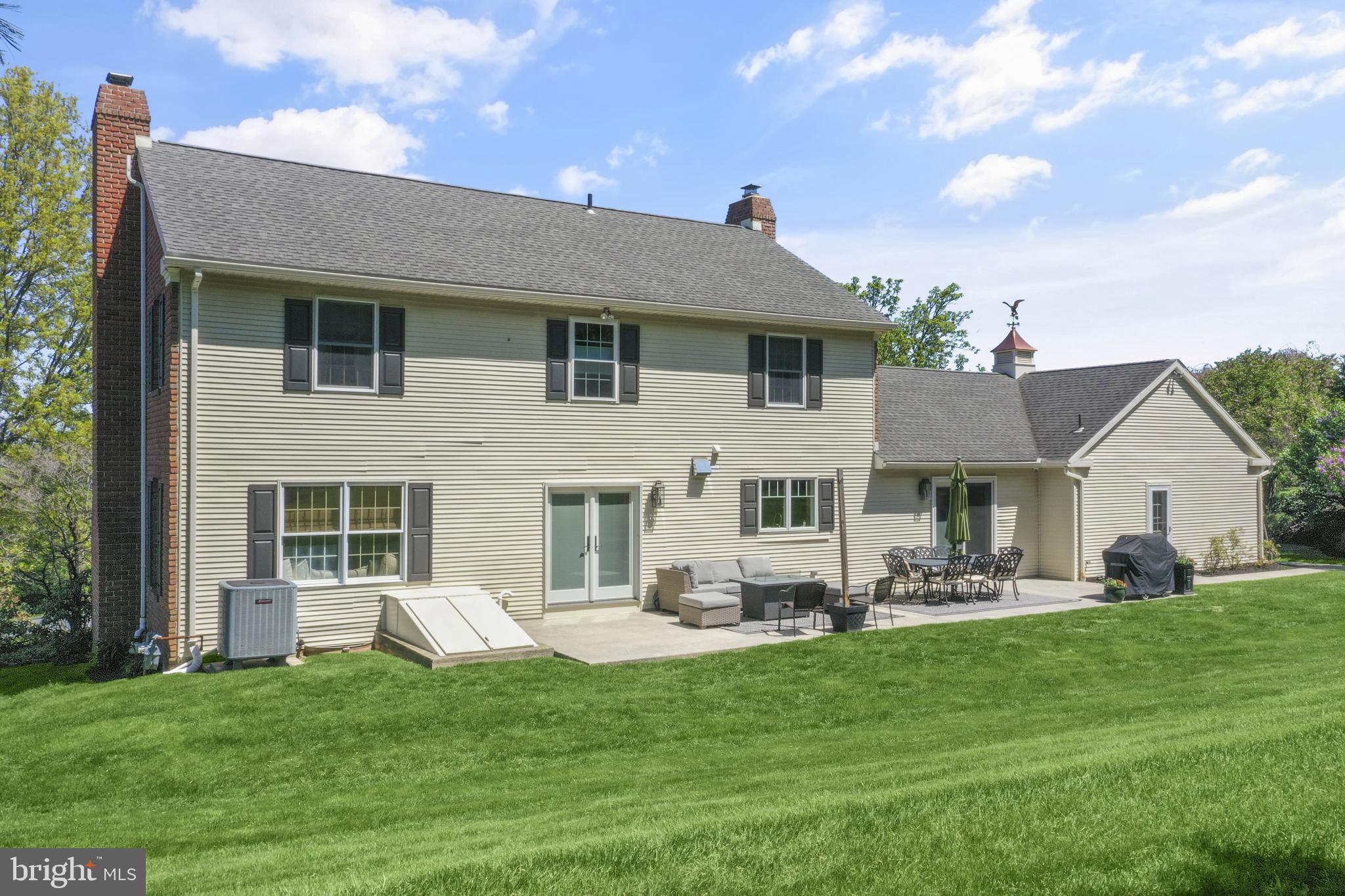 530 Arrowhead Trail Sinking Spring, PA 19608 - Photo 35 of 52 a front view of a house with a garden and plants