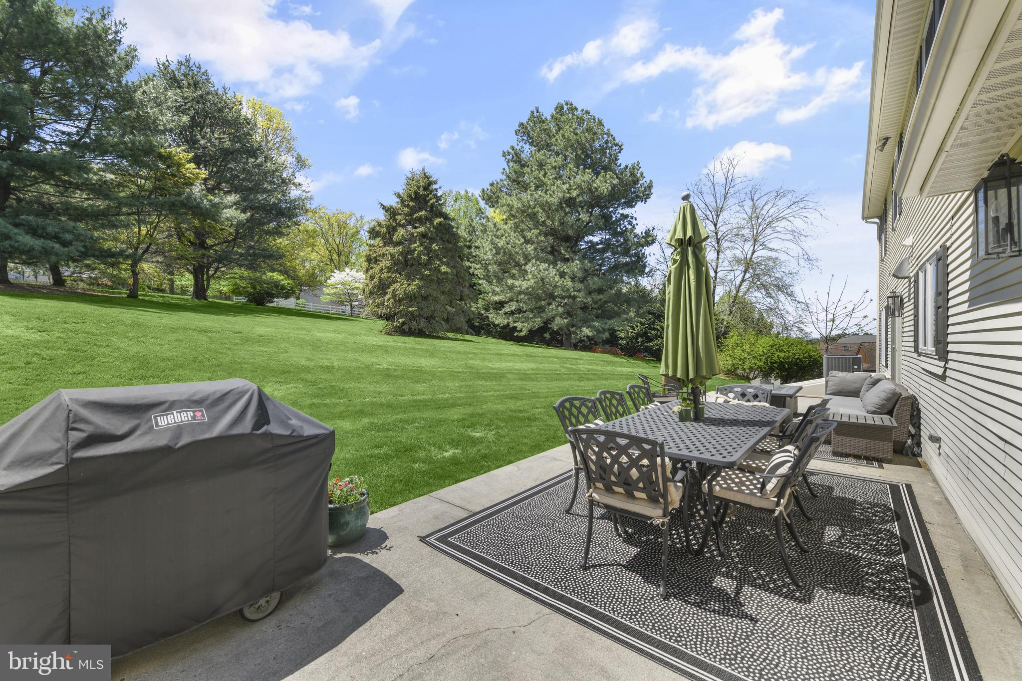 530 Arrowhead Trail Sinking Spring, PA 19608 - Photo 38 of 52 a view of a patio with a table chairs and a fire pit