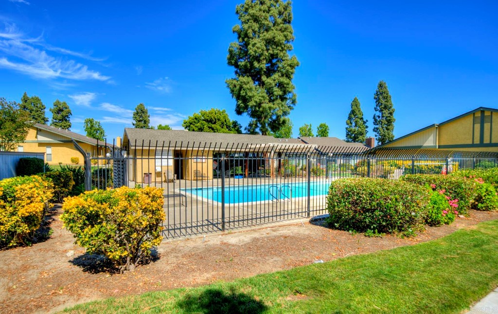 643 Persimmon Way Oceanside, CA 92058 - Photo 1 of 1 a view of a house with a yard and potted plants