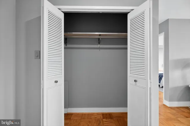 a view of a hallway with closet