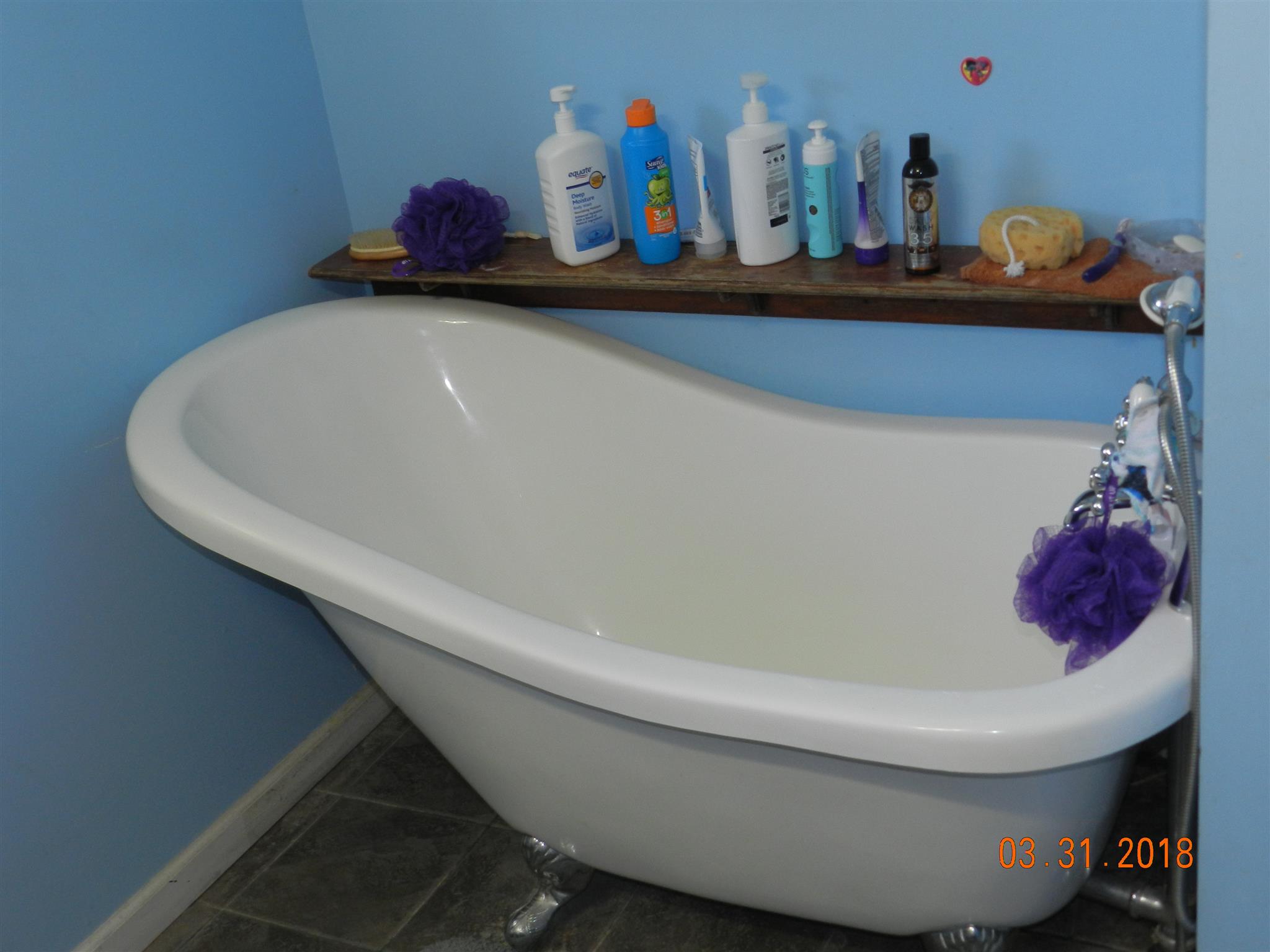 411 Burch Road Clarksville, TN 37042 - Photo 14 of 19 a bathroom with a sink and a wooden floor