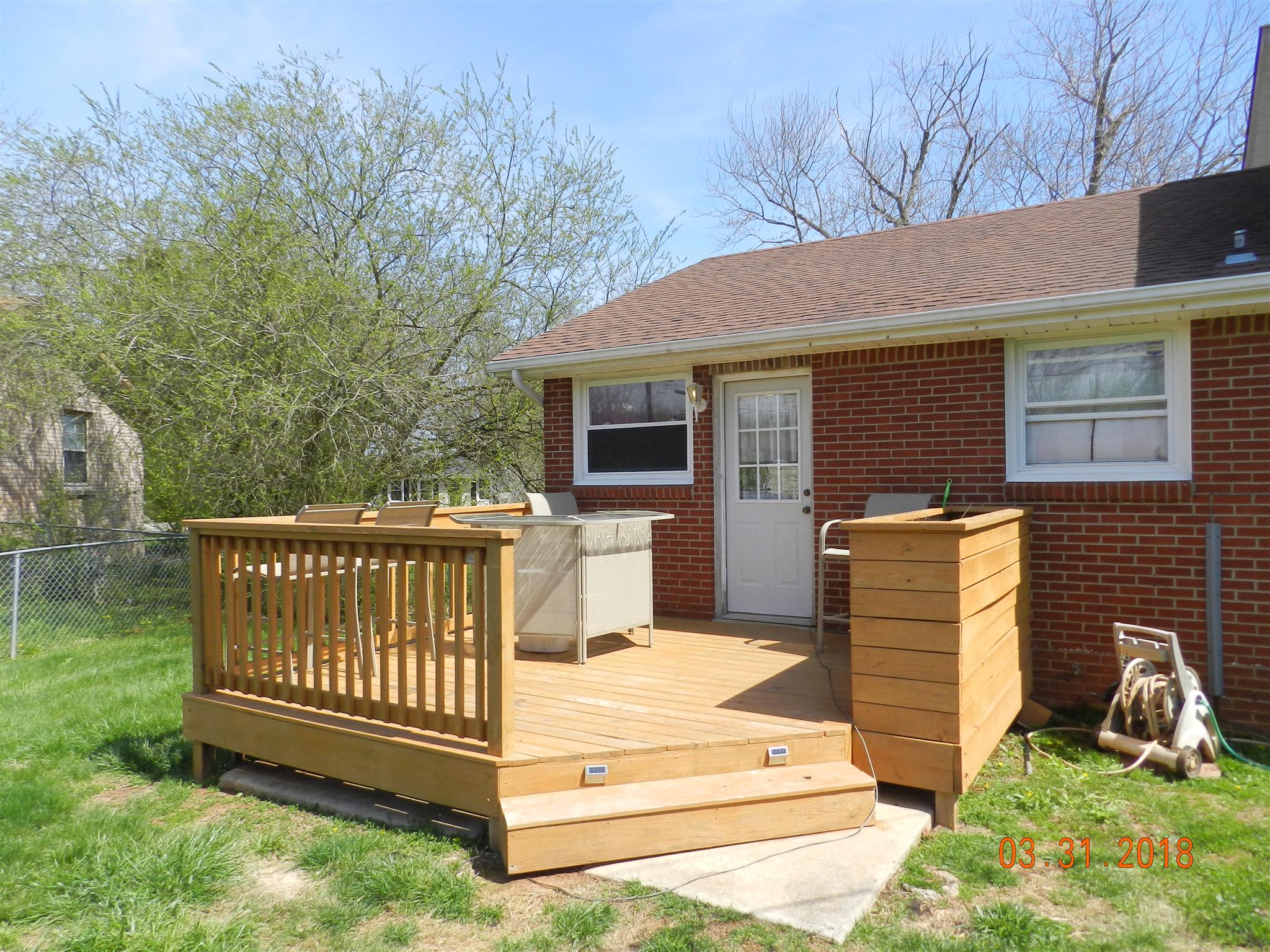 411 Burch Road Clarksville, TN 37042 - Photo 18 of 19 a view of a house with a yard