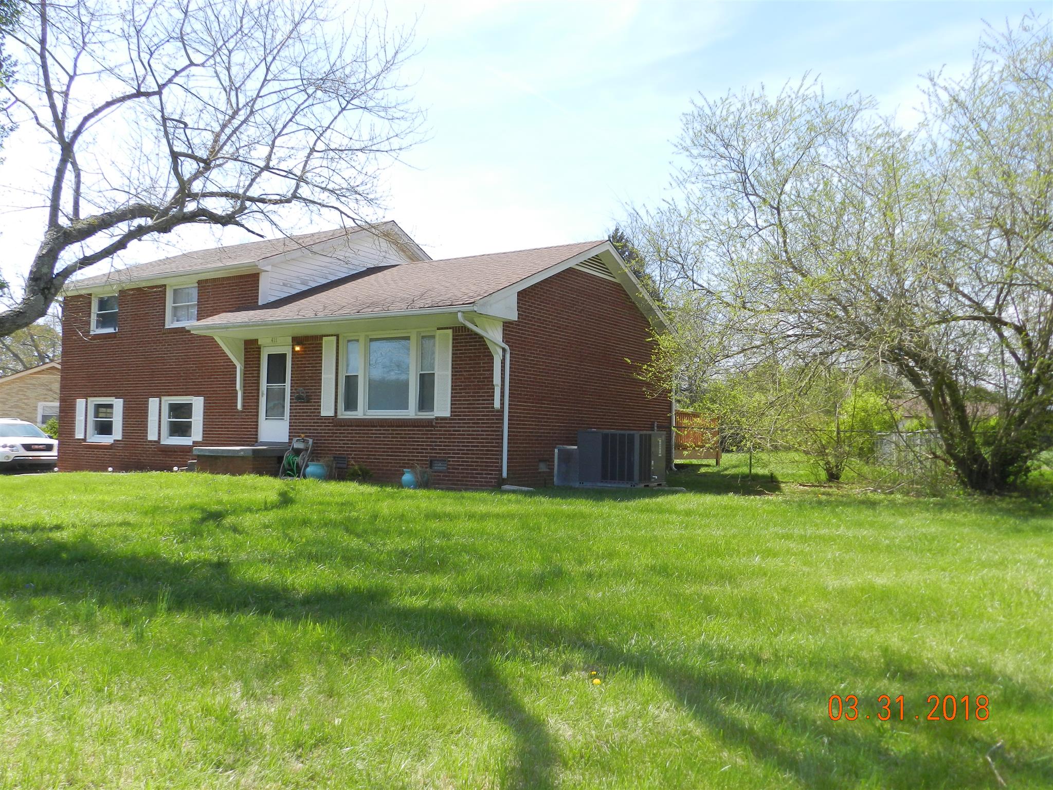 411 Burch Road Clarksville, TN 37042 - Photo 19 of 19 a house view with a garden space