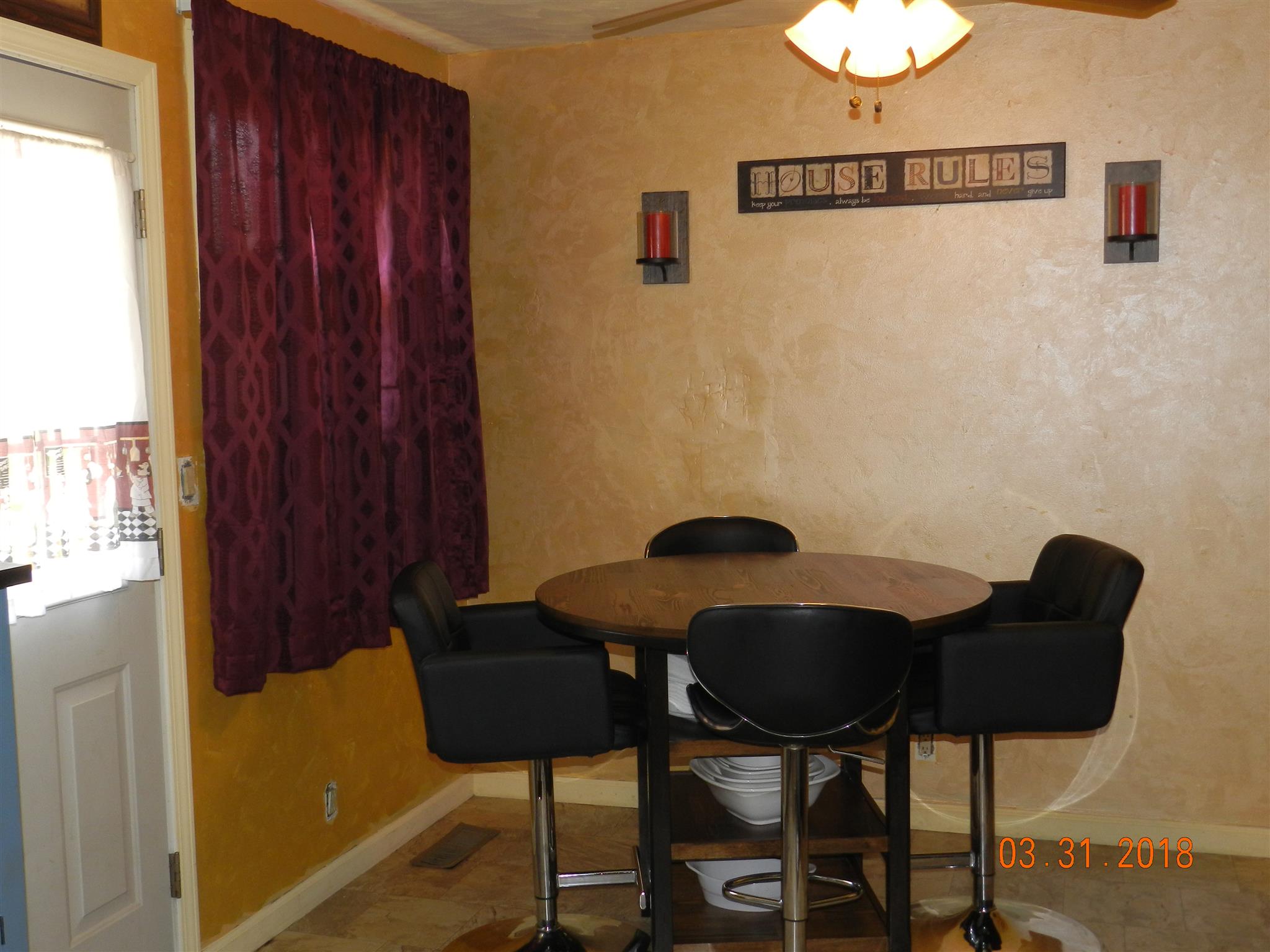 411 Burch Road Clarksville, TN 37042 - Photo 7 of 19 a view of a chairs and table in a room