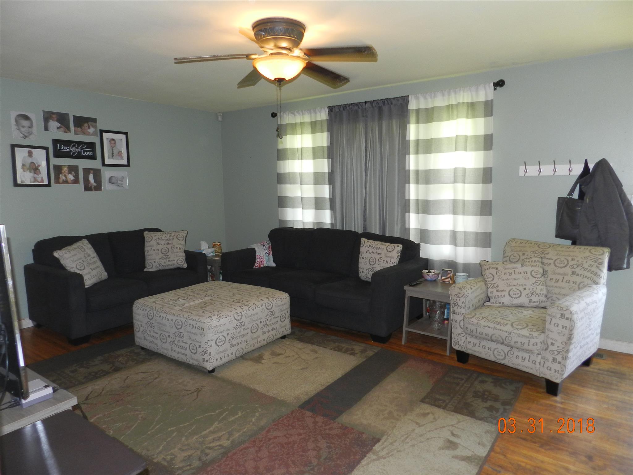 411 Burch Road Clarksville, TN 37042 - Photo 8 of 19 a living room with furniture and a large window