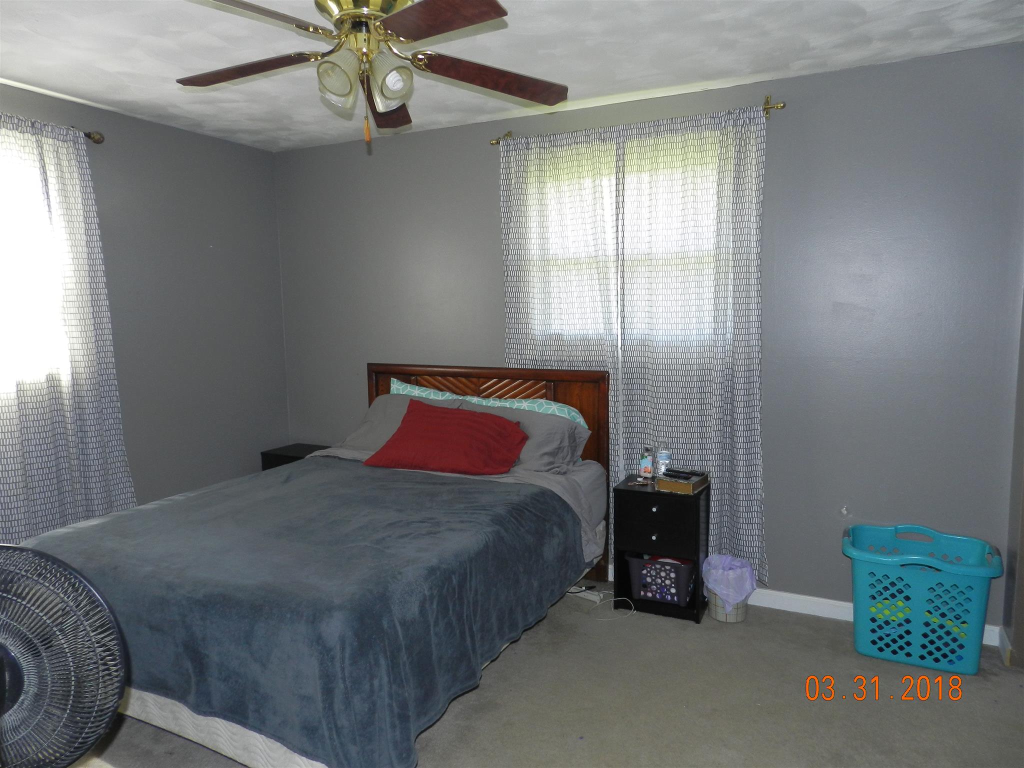 411 Burch Road Clarksville, TN 37042 - Photo 9 of 19 a bedroom with a bed and window