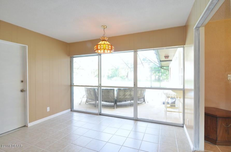 922 Valencia Road South Daytona, FL 32119 - Photo 11 of 31 dining to patio