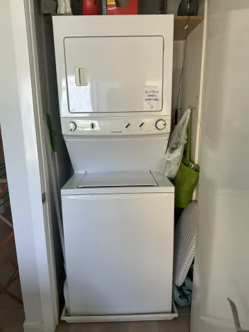 a view of a garden with an apartment