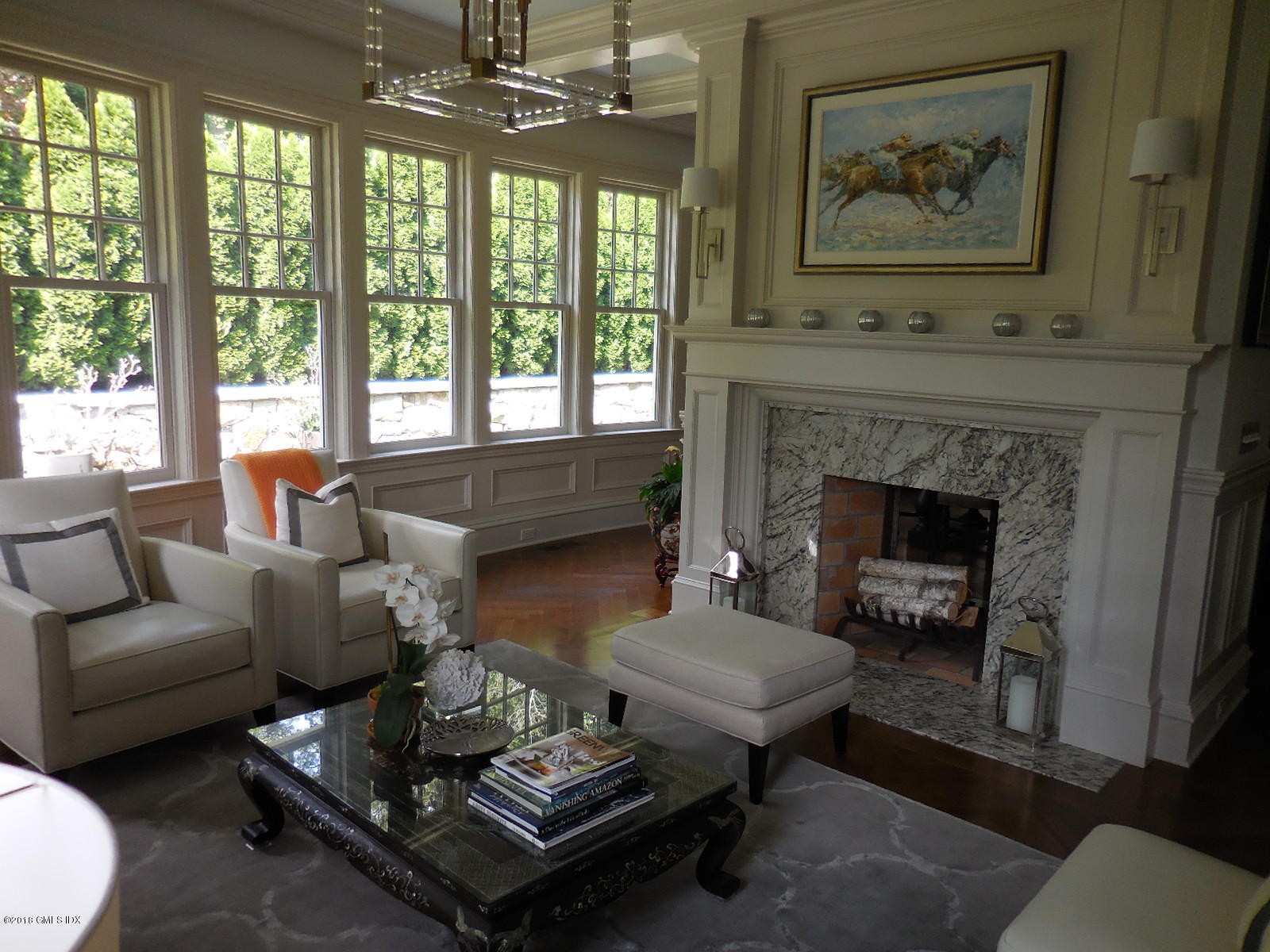 50 Hillside Drive Greenwich, CT 06830 - Photo 11 of 16 a living room with furniture and a fireplace