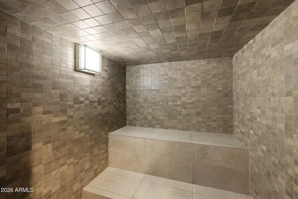 a view of a living room and chandelier