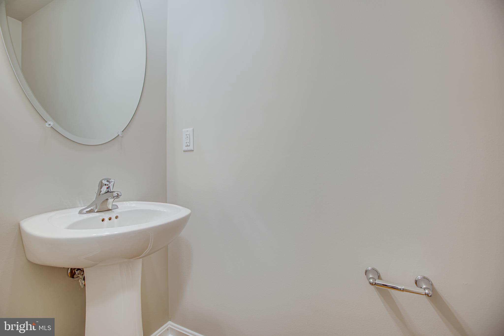 282 Circle Lane Colonial Beach, VA 22443 - Photo 11 of 57 a bathroom with a sink and a mirror
