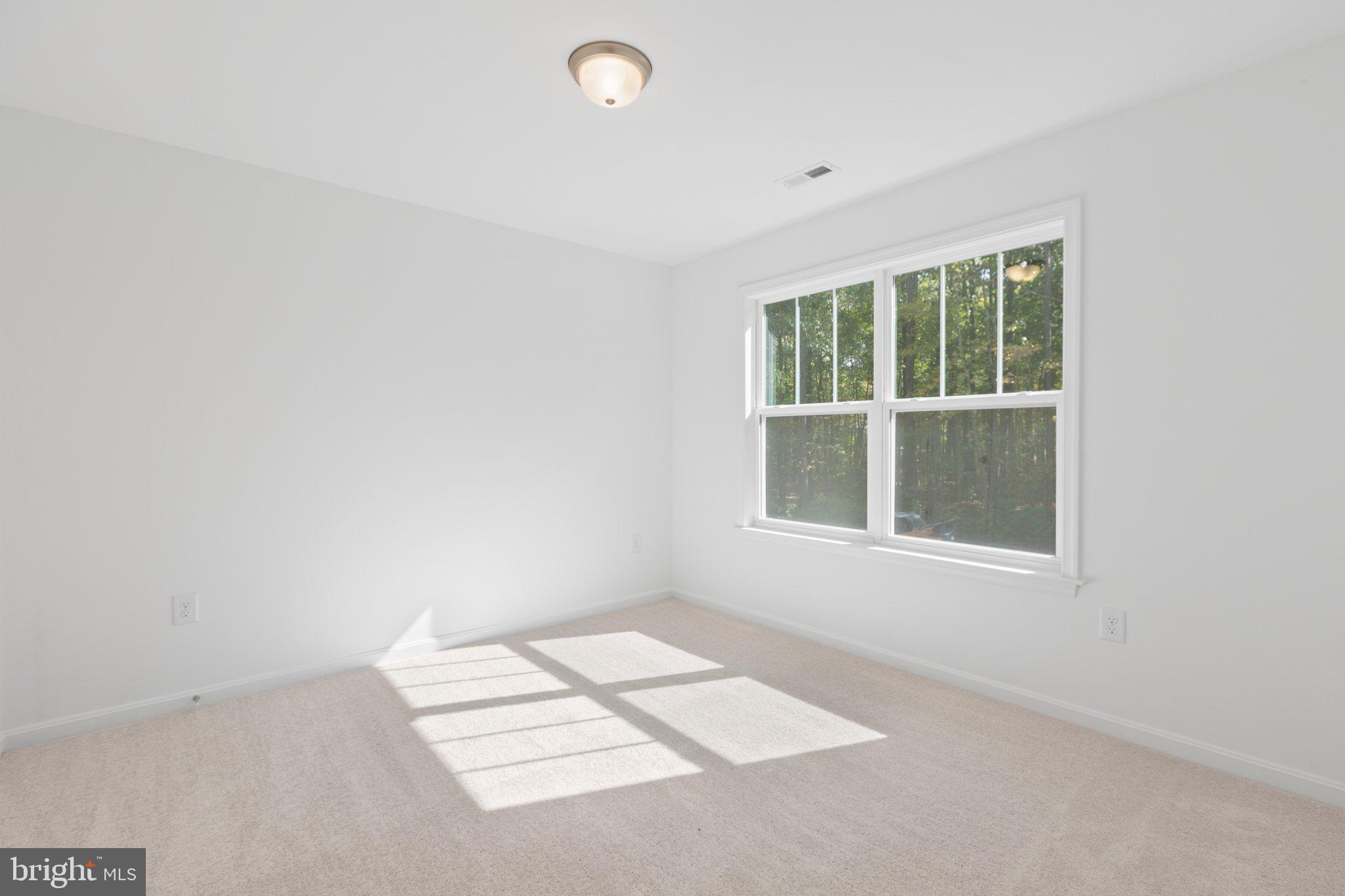 282 Circle Lane Colonial Beach, VA 22443 - Photo 19 of 57 a view of an empty room with a window
