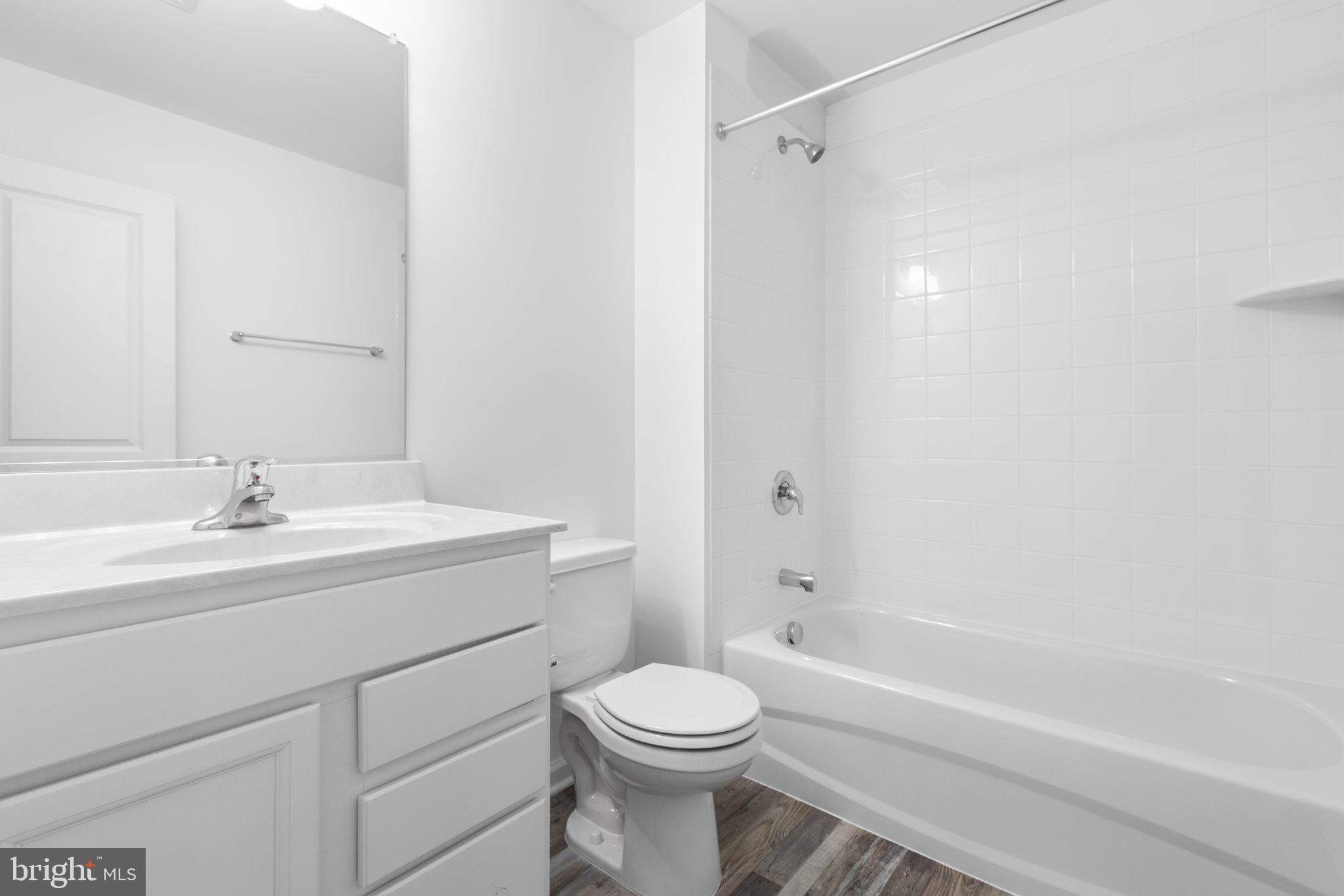 282 Circle Lane Colonial Beach, VA 22443 - Photo 22 of 57 a bathroom with a sink a toilet and a bathtub