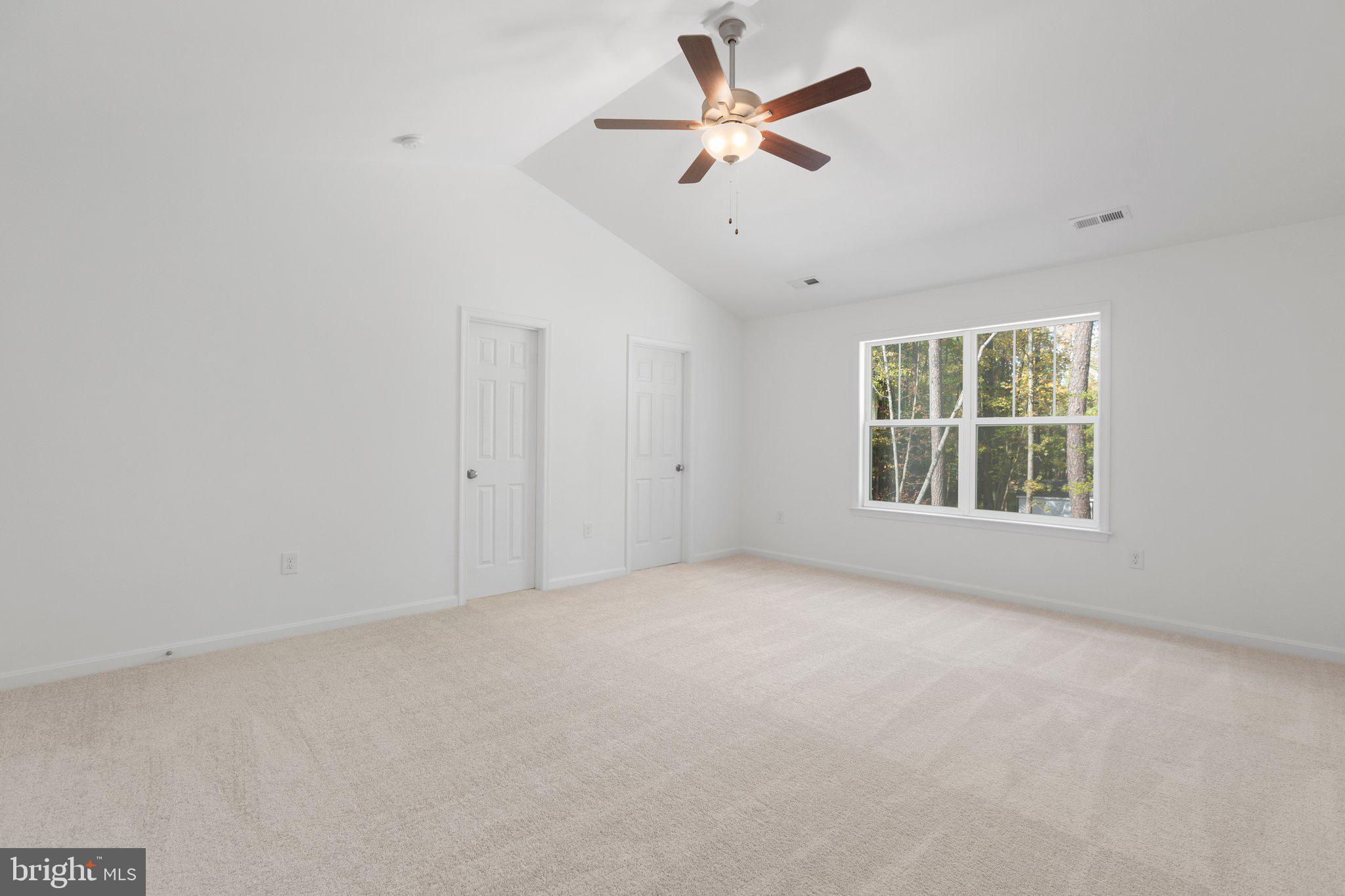 282 Circle Lane Colonial Beach, VA 22443 - Photo 32 of 57 an empty room with a window and a fan