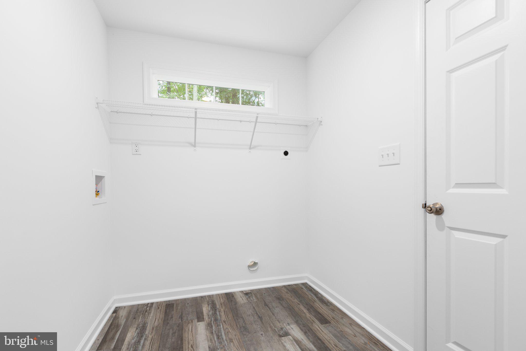 282 Circle Lane Colonial Beach, VA 22443 - Photo 49 of 57 a view of a room with racks on the wall